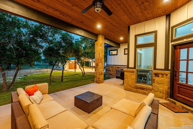 view of patio with an outdoor hangout area and a ceiling fan