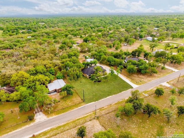 bird's eye view featuring a view of trees