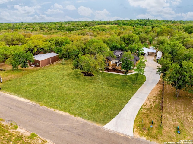 bird's eye view featuring a view of trees