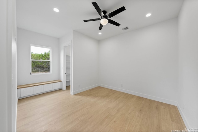 265 Vaquero Dr, Pipe Creek, TX 78063 - unfurnished room featuring light wood finished floors, ceiling fan, baseboards, and recessed lighting