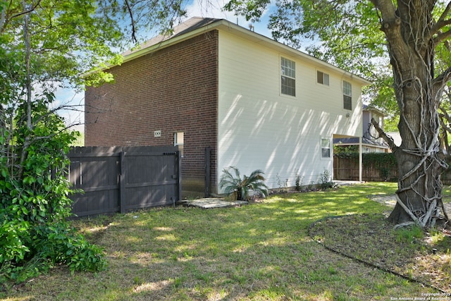 6530 Lochglen, San Antonio, TX 78240 - view of property exterior with a yard, a fenced backyard, and brick siding