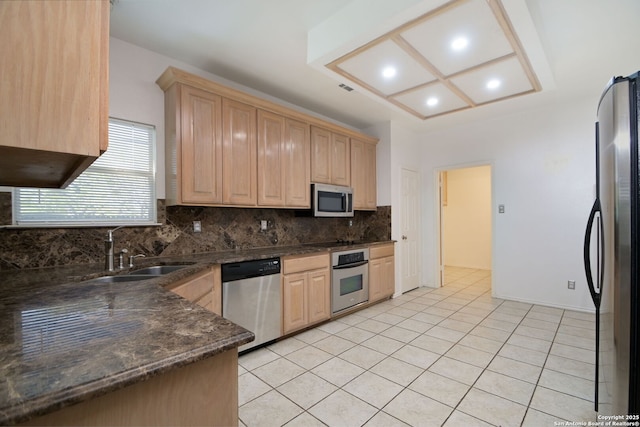 6530 Lochglen, San Antonio, TX 78240 - kitchen with tasteful backsplash, a sink, appliances with stainless steel finishes, and light brown cabinets