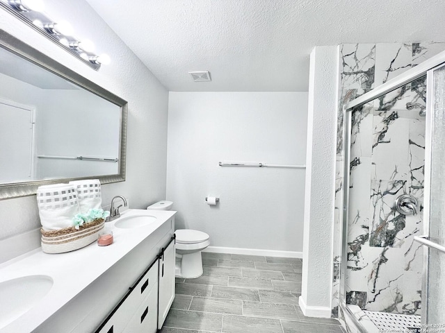 full bath featuring visible vents, toilet, a marble finish shower, and a sink