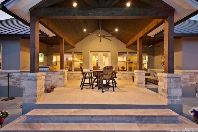 view of patio featuring outdoor dining space and ceiling fan