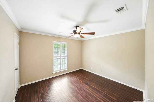 unfurnished room with dark wood finished floors, visible vents, a ceiling fan, and baseboards