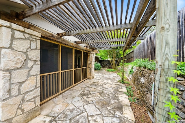 view of patio / terrace featuring a pergola and a fenced backyard