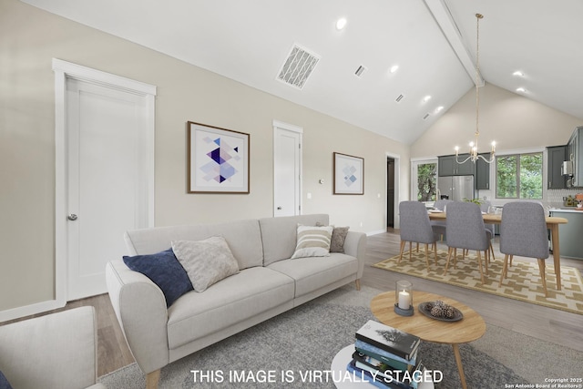 living room with wood finished floors, a chandelier, beam ceiling, visible vents, and high vaulted ceiling