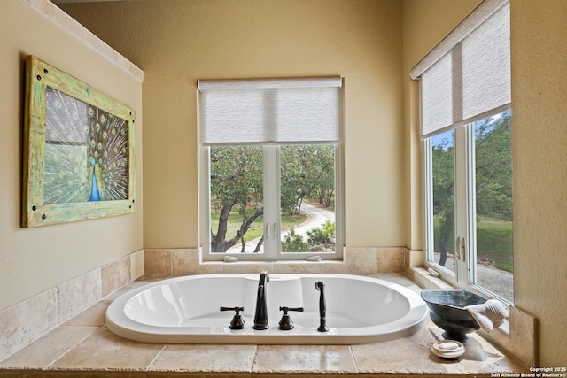 bathroom featuring a garden tub