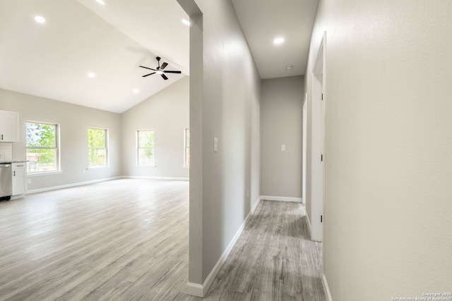 908 Plum, Floresville, TX 78114 - hall with a healthy amount of sunlight, light wood-type flooring, recessed lighting, and baseboards