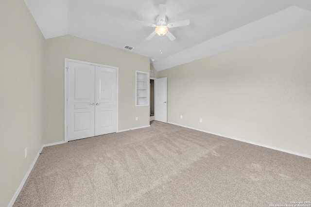 12739 Gruene Pass, San Antonio, TX 78253 - unfurnished bedroom with lofted ceiling, carpet flooring, visible vents, a closet, and baseboards