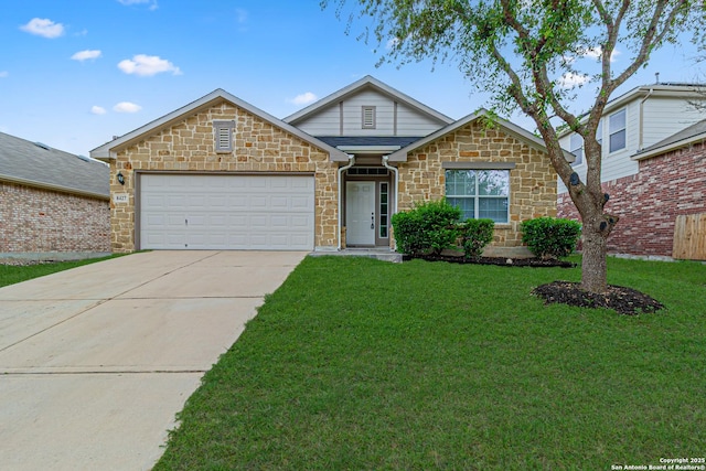view of front of home with a garage, a front lawn, driveway, and stone siding