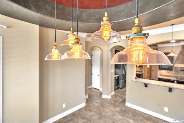 interior space featuring carpet floors and baseboards