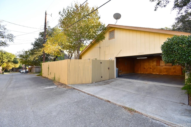 15019 Churchill Ests, San Antonio, TX 78248 - view of side of property featuring a gate, fence, and a garage