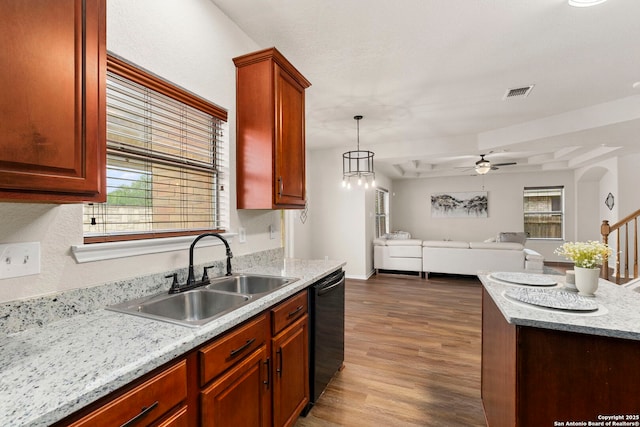 kitchen with visible vents, a ceiling fan, open floor plan, black dishwasher, and a sink