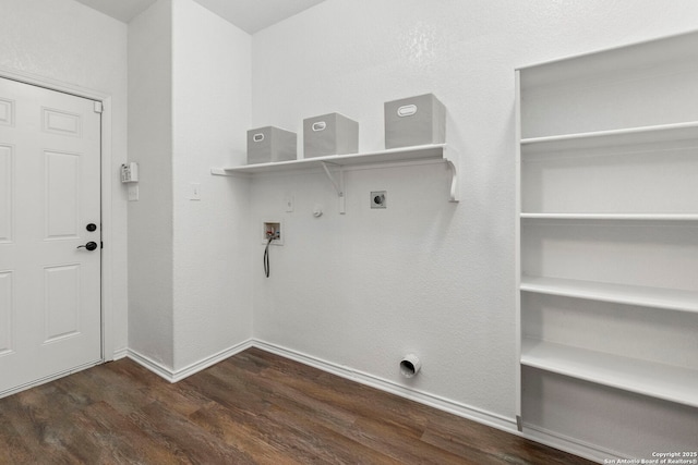 washroom featuring hookup for an electric dryer, laundry area, hookup for a gas dryer, baseboards, and dark wood-style floors