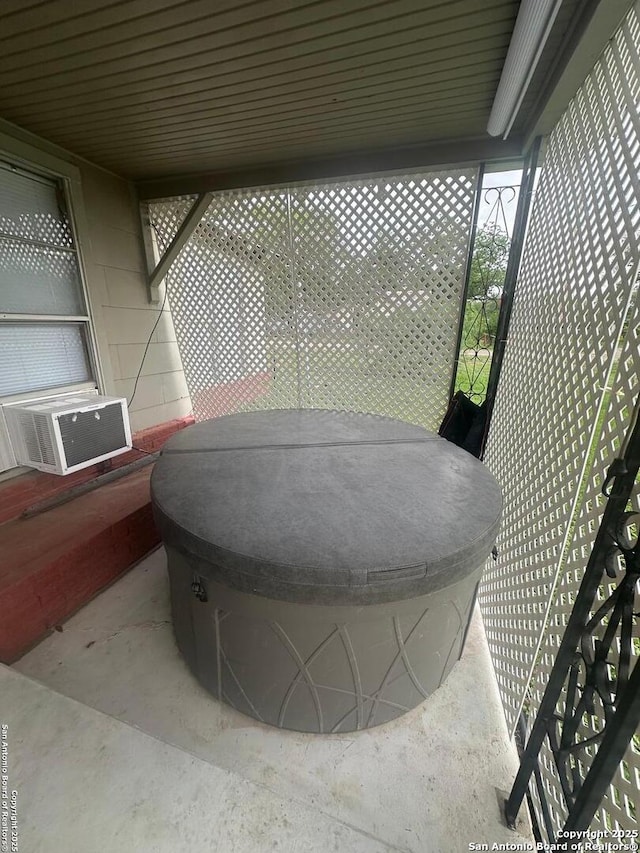 details featuring cooling unit and a jacuzzi