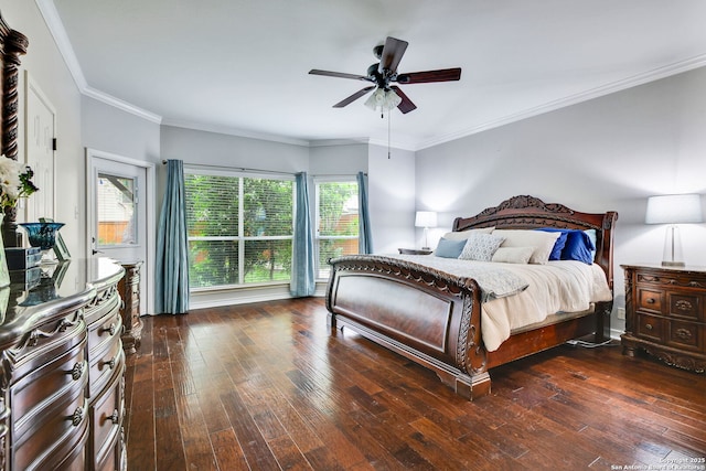 bedroom with crown molding, a ceiling fan, and dark wood-type flooring