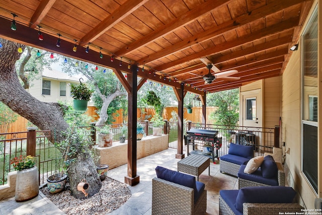 view of patio / terrace with an outdoor living space, a fenced backyard, ceiling fan, and area for grilling
