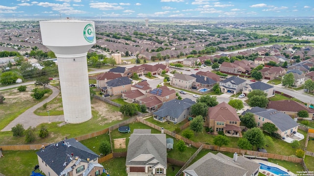 birds eye view of property with a residential view