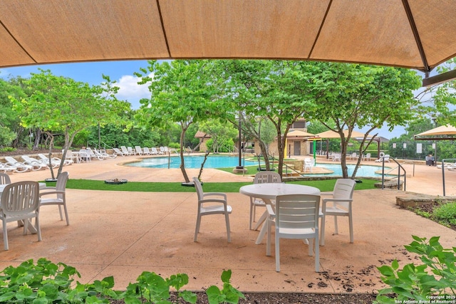 13810 Kotili, San Antonio, TX 78245 - view of patio / terrace featuring a community pool