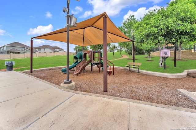 13810 Kotili, San Antonio, TX 78245 - community play area with a lawn and fence