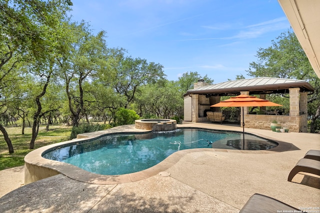view of pool featuring a gazebo, a patio area, and a pool with connected hot tub
