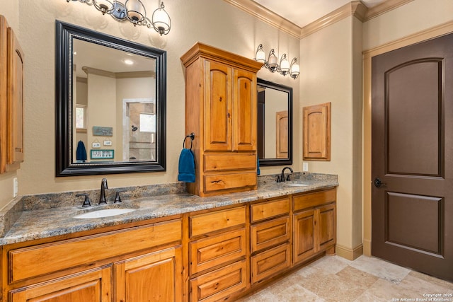 bathroom with double vanity, crown molding, and a sink