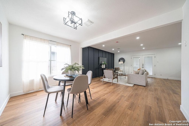 dining area with visible vents, recessed lighting, light wood-style flooring, and baseboards