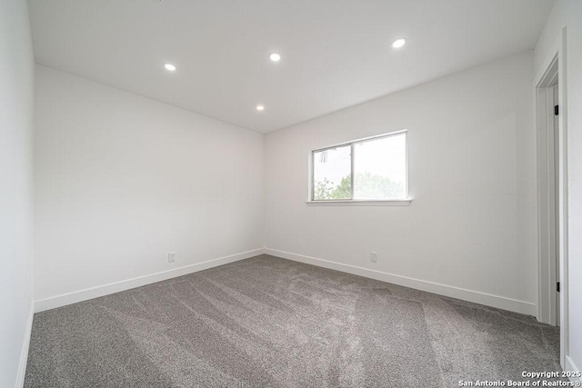 empty room featuring baseboards, recessed lighting, and carpet flooring
