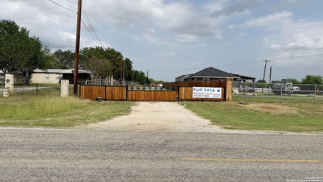 7274 Fm 327, Elmendorf, TX 78112 - view of road featuring driveway and a gate
