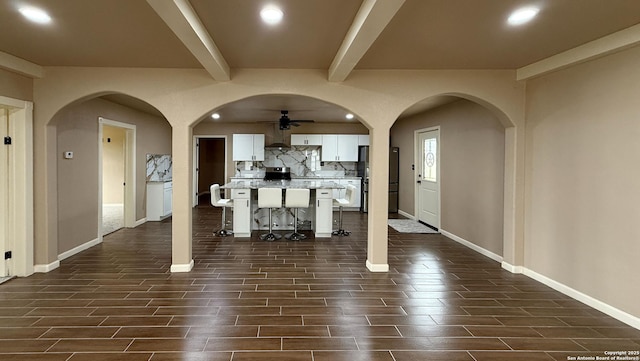 7274 Fm 327, Elmendorf, TX 78112 - living area with beam ceiling, dark wood-style flooring, a ceiling fan, and recessed lighting