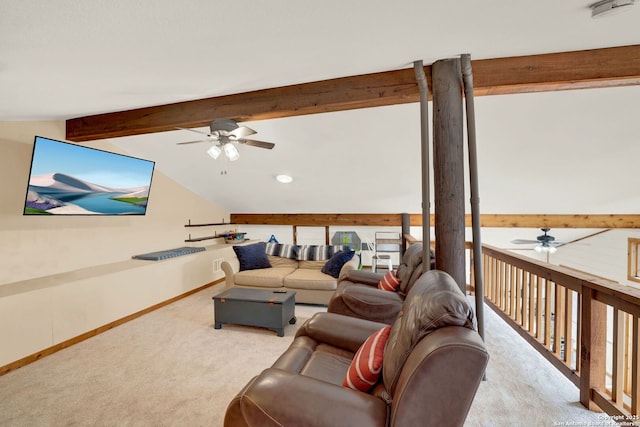 living area featuring a ceiling fan, baseboards, vaulted ceiling with beams, and carpet floors