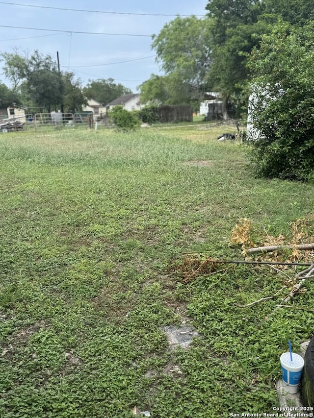 view of yard featuring fence