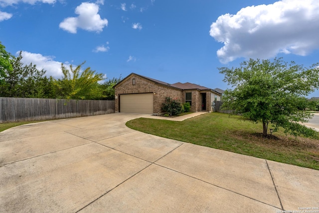 4650 Trevor Way, San Antonio, TX 78217 - ranch-style house featuring a front lawn, a garage, brick siding, concrete driveway, and fence