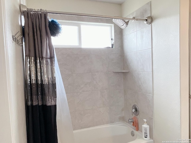 full bathroom featuring shower / tub combo with curtain