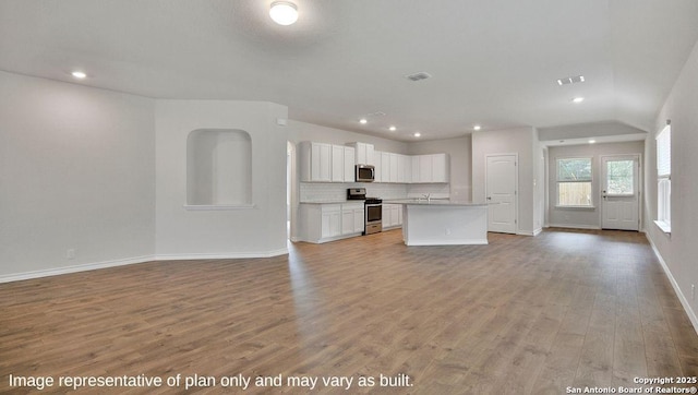 interior space featuring visible vents, recessed lighting, and light wood-type flooring