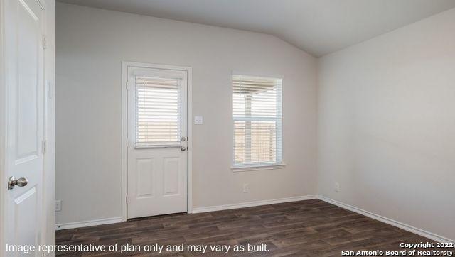 5055 Wichita Pike, San Antonio, TX 78253 - interior space with lofted ceiling, wood finished floors, and baseboards