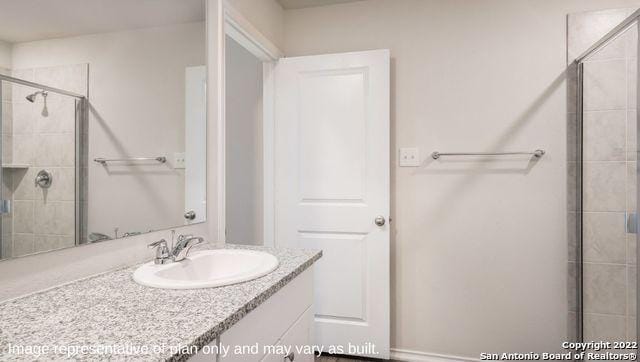 5055 Wichita Pike, San Antonio, TX 78253 - full bathroom with tiled shower and vanity