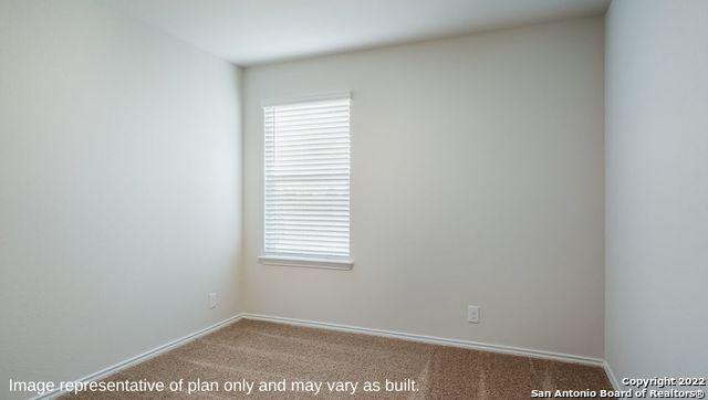 5055 Wichita Pike, San Antonio, TX 78253 - spare room featuring a wealth of natural light, baseboards, and carpet floors
