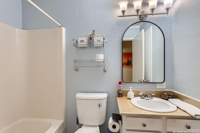 full bathroom with vanity, toilet, and bathing tub / shower combination