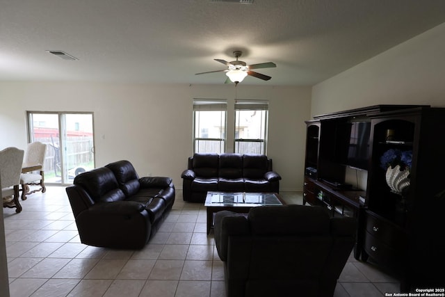 4326 Safe Hbr, San Antonio, TX 78244 - living area featuring light tile patterned flooring, a ceiling fan, and visible vents