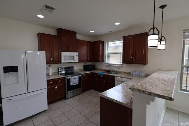 4326 Safe Hbr, San Antonio, TX 78244 - kitchen with a peninsula, white appliances, light tile patterned flooring, and visible vents