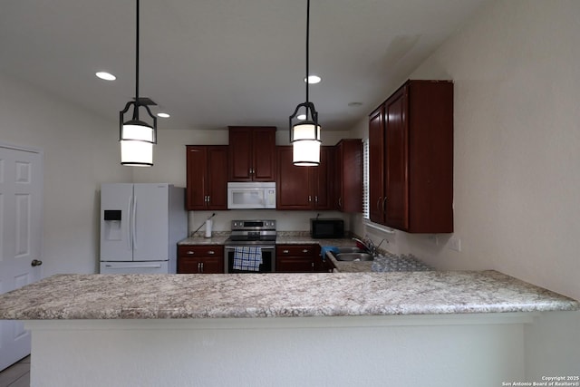 4326 Safe Hbr, San Antonio, TX 78244 - kitchen featuring decorative light fixtures, a sink, a peninsula, recessed lighting, and white appliances