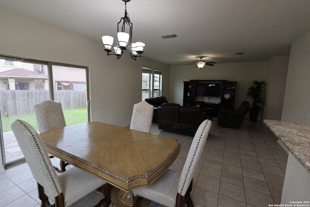 4326 Safe Hbr, San Antonio, TX 78244 - dining space featuring light tile patterned flooring, visible vents, and ceiling fan with notable chandelier