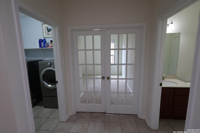 4326 Safe Hbr, San Antonio, TX 78244 - laundry area with laundry area, washer / clothes dryer, light tile patterned floors, and french doors