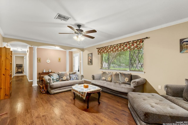 114 Nueces, Seguin, TX 78155 - living area featuring ornamental molding, arched walkways, visible vents, and ornate columns