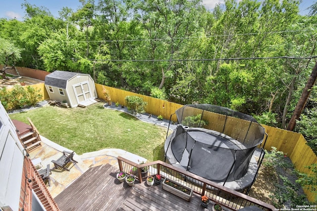 19538 Azure Oak, San Antonio, TX 78258 - view of yard with a storage shed, a deck, an outdoor structure, and a fenced backyard