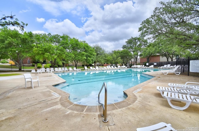 19538 Azure Oak, San Antonio, TX 78258 - community pool featuring a patio and fence