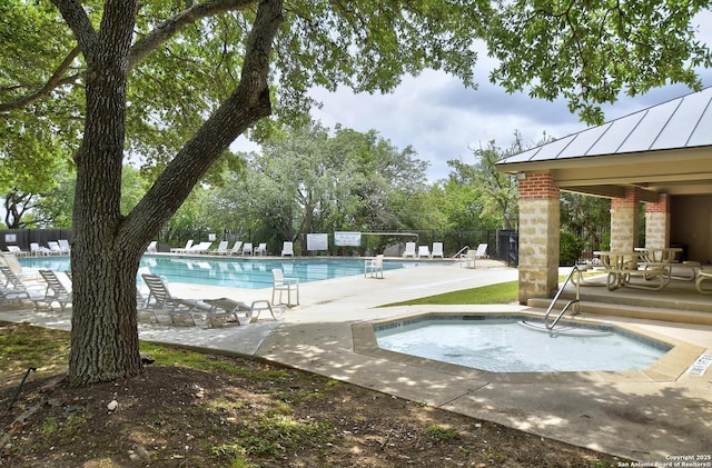 19538 Azure Oak, San Antonio, TX 78258 - pool with a patio, fence, and a hot tub