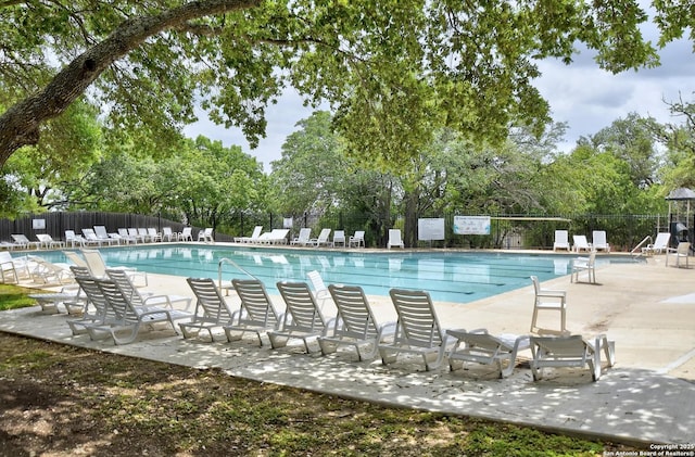 19538 Azure Oak, San Antonio, TX 78258 - community pool featuring a patio and fence